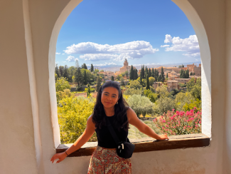 Gabby Villalpando Torres with mountainside landscape in the background