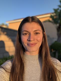 Headshot of a person taken outside